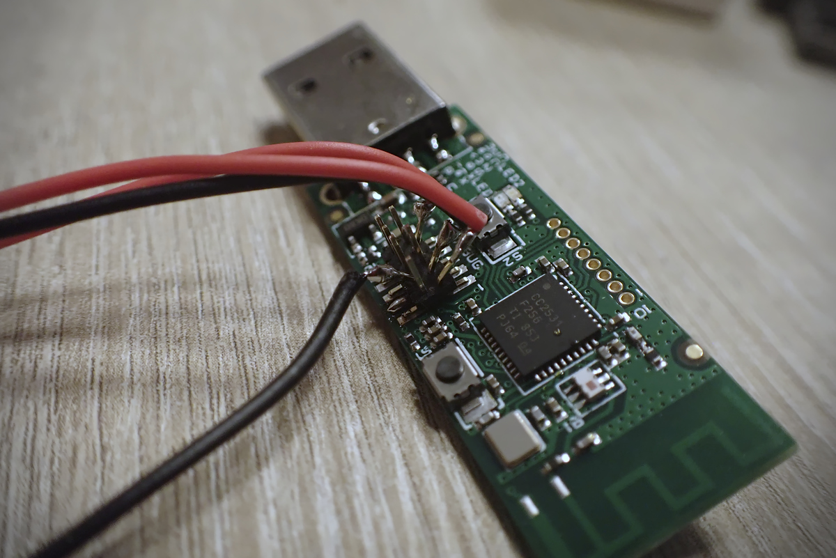 Debug pins on the Zigbee dongle with wires attached